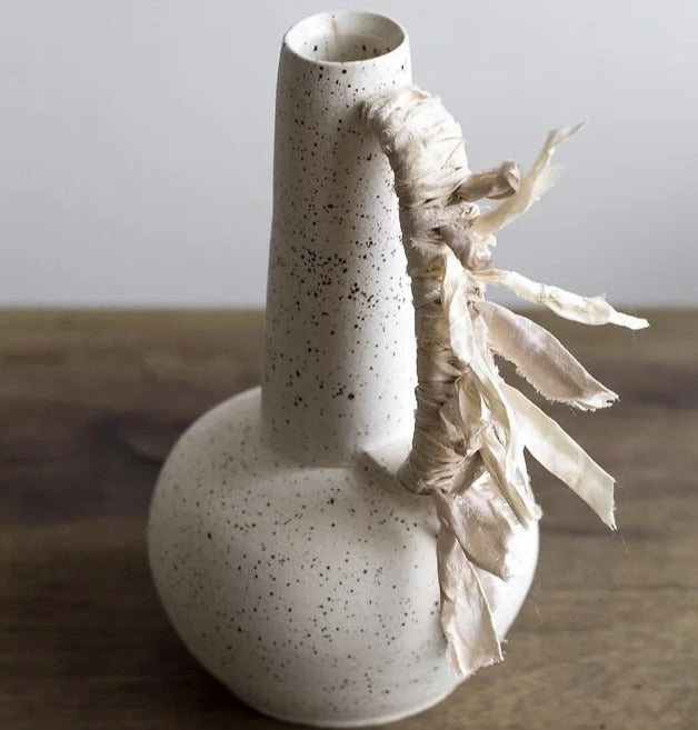 ceramic vase bottle with silk wrapped handle